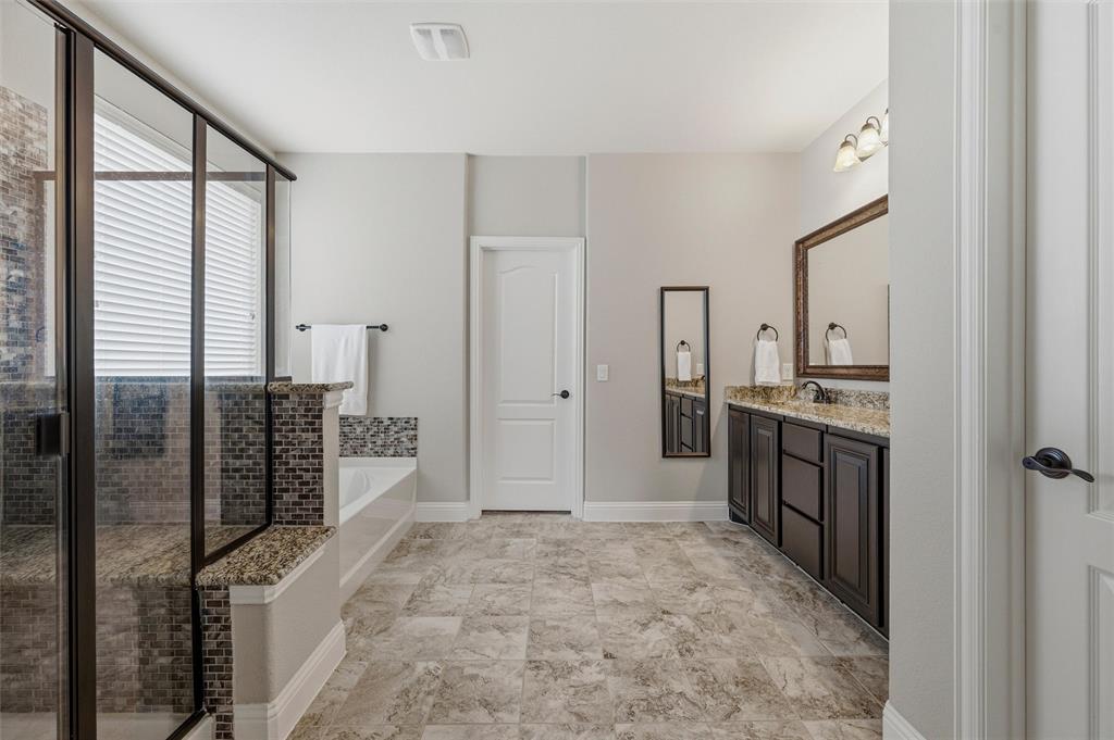 1215 The Trails Drive Blue Ridge, TX 75424 - Photo 20 of 40 Primary Bathroom with Granite Vanity, Dual Sinks, Separate Walk In Shower.