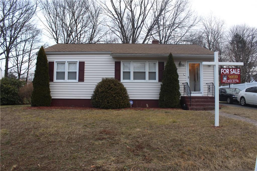 55 Belden Road Hamden, CT 06514 - Photo 1 of 1 a view of a house with a yard and garage