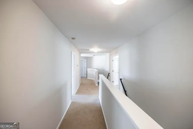 a view of a hallway with a couch