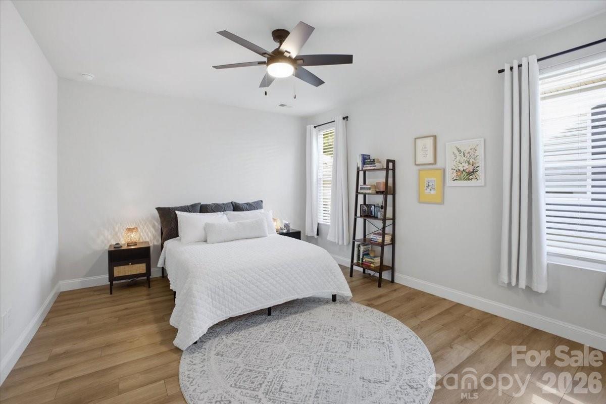 602 Banter Lane Cramerton, NC 28056 - Photo 12 of 33 a spacious bedroom with a bed and a window