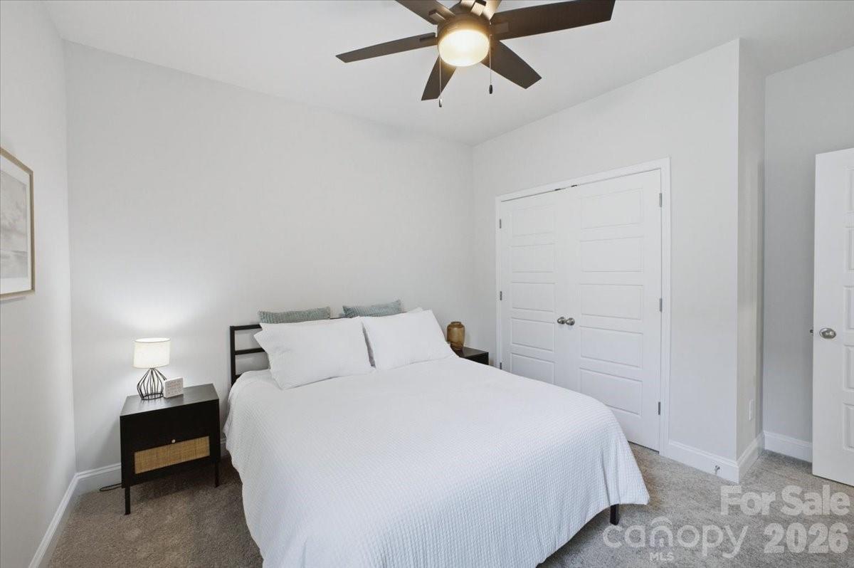 602 Banter Lane Cramerton, NC 28056 - Photo 19 of 33 a bedroom with a bed and window