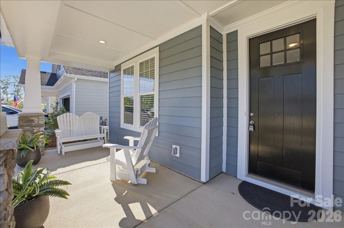 602 Banter Lane Cramerton, NC 28056 - Photo 2 of 33 a view of livingroom with furniture and floor to ceiling window