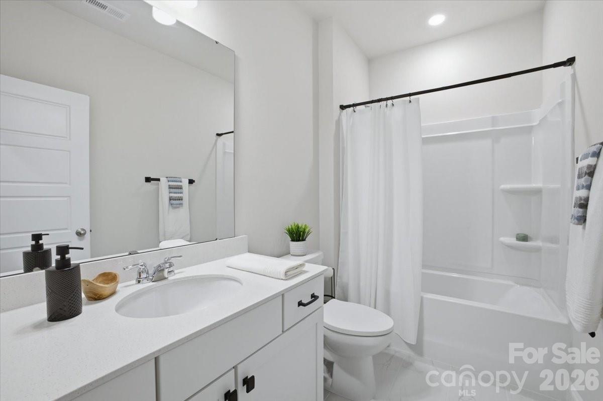 602 Banter Lane Cramerton, NC 28056 - Photo 23 of 33 a bathroom with a sink toilet and shower