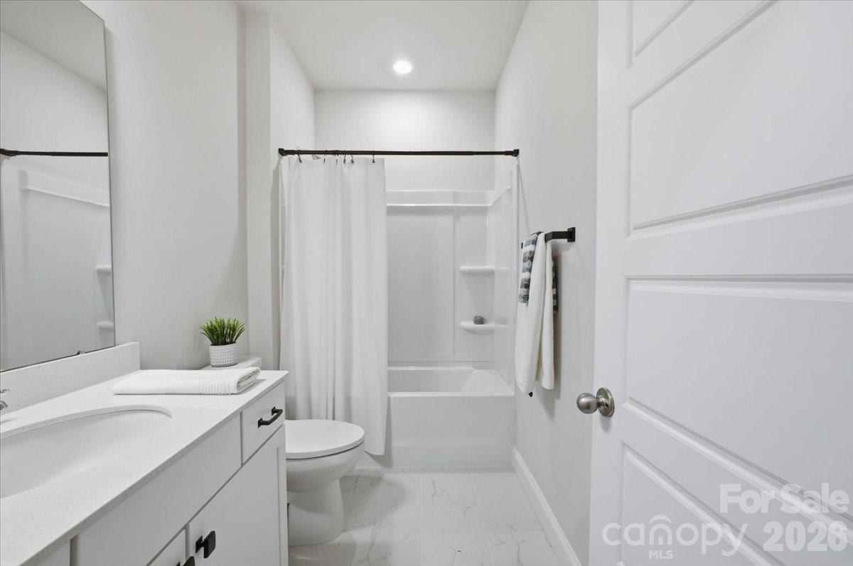 602 Banter Lane Cramerton, NC 28056 - Photo 24 of 33 a bathroom with a granite countertop sink toilet and shower