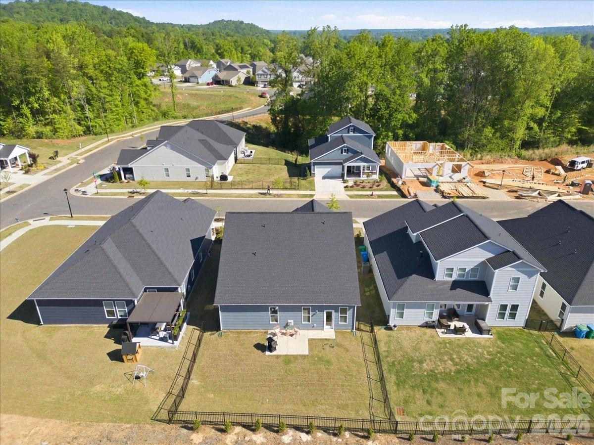 602 Banter Lane Cramerton, NC 28056 - Photo 32 of 33 an aerial view of a house with a garden and lake view