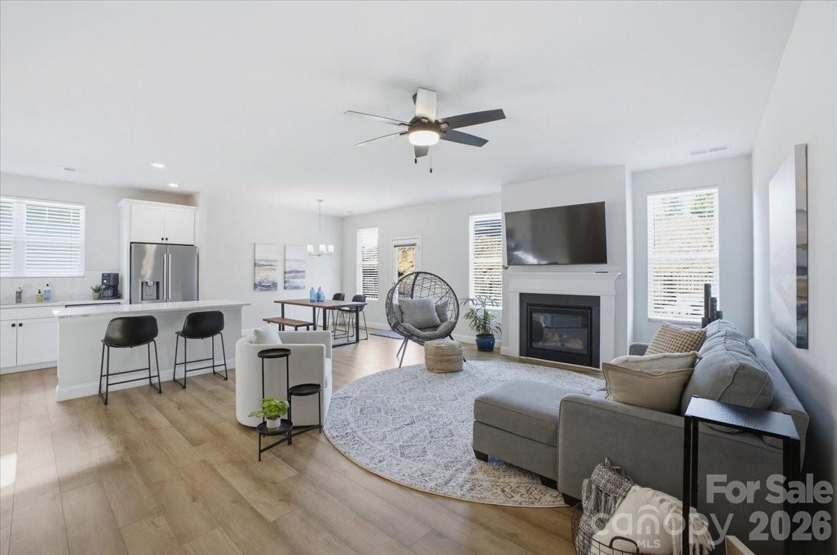 602 Banter Lane Cramerton, NC 28056 - Photo 4 of 33 a living room with furniture fireplace and flat screen tv