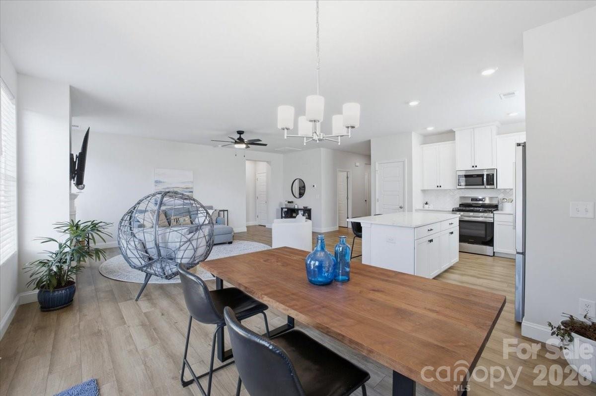 602 Banter Lane Cramerton, NC 28056 - Photo 9 of 33 a view of a dining room with furniture