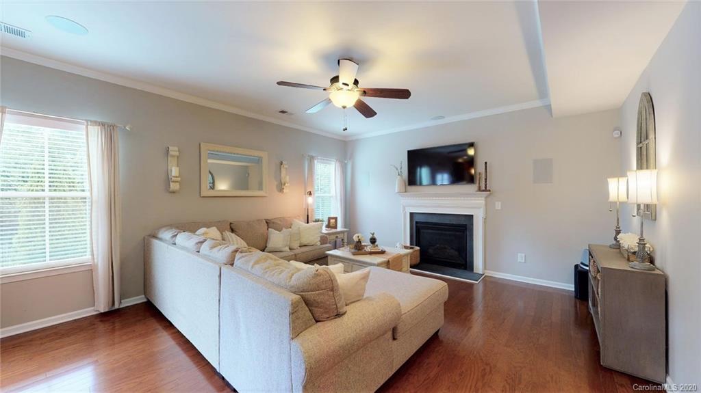 3010 Fallondale Road Waxhaw, NC 28173 - Photo 11 of 44 a living room with furniture and a fireplace