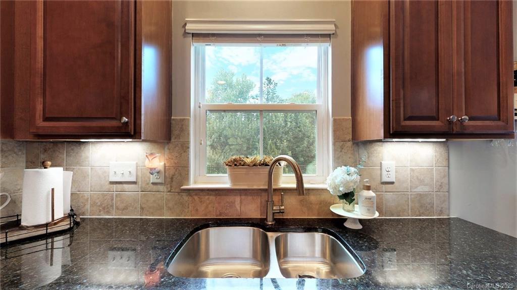 3010 Fallondale Road Waxhaw, NC 28173 - Photo 21 of 44 a kitchen with a sink and a cabinets