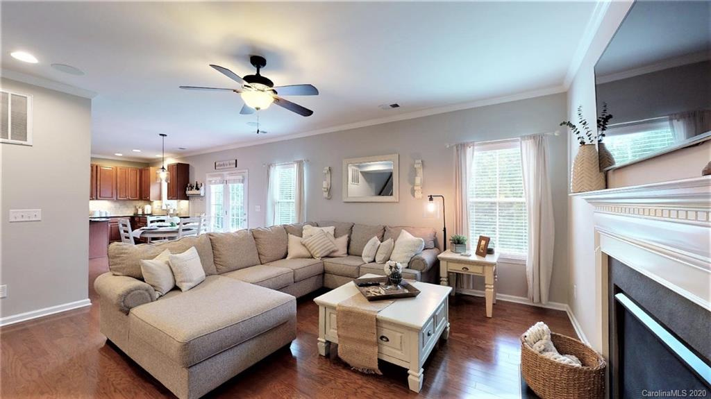 3010 Fallondale Road Waxhaw, NC 28173 - Photo 8 of 44 a living room with furniture and a fireplace