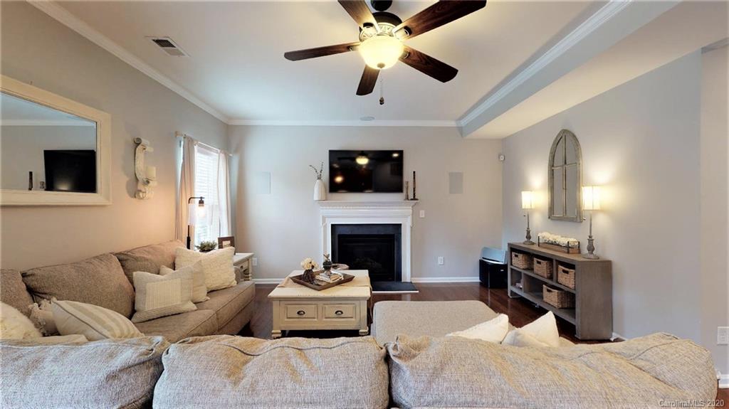 3010 Fallondale Road Waxhaw, NC 28173 - Photo 10 of 44 a bedroom with furniture and a fireplace