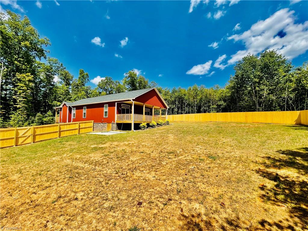 3575 Old Mountain Road Lexington, NC 27292 - Photo 8 of 46 HUGE FENCED BACKYARD FOR PETS !! PRIVATE! CUSTOM BUILT FENCE TO GRADE OF LAND WITH GATES!