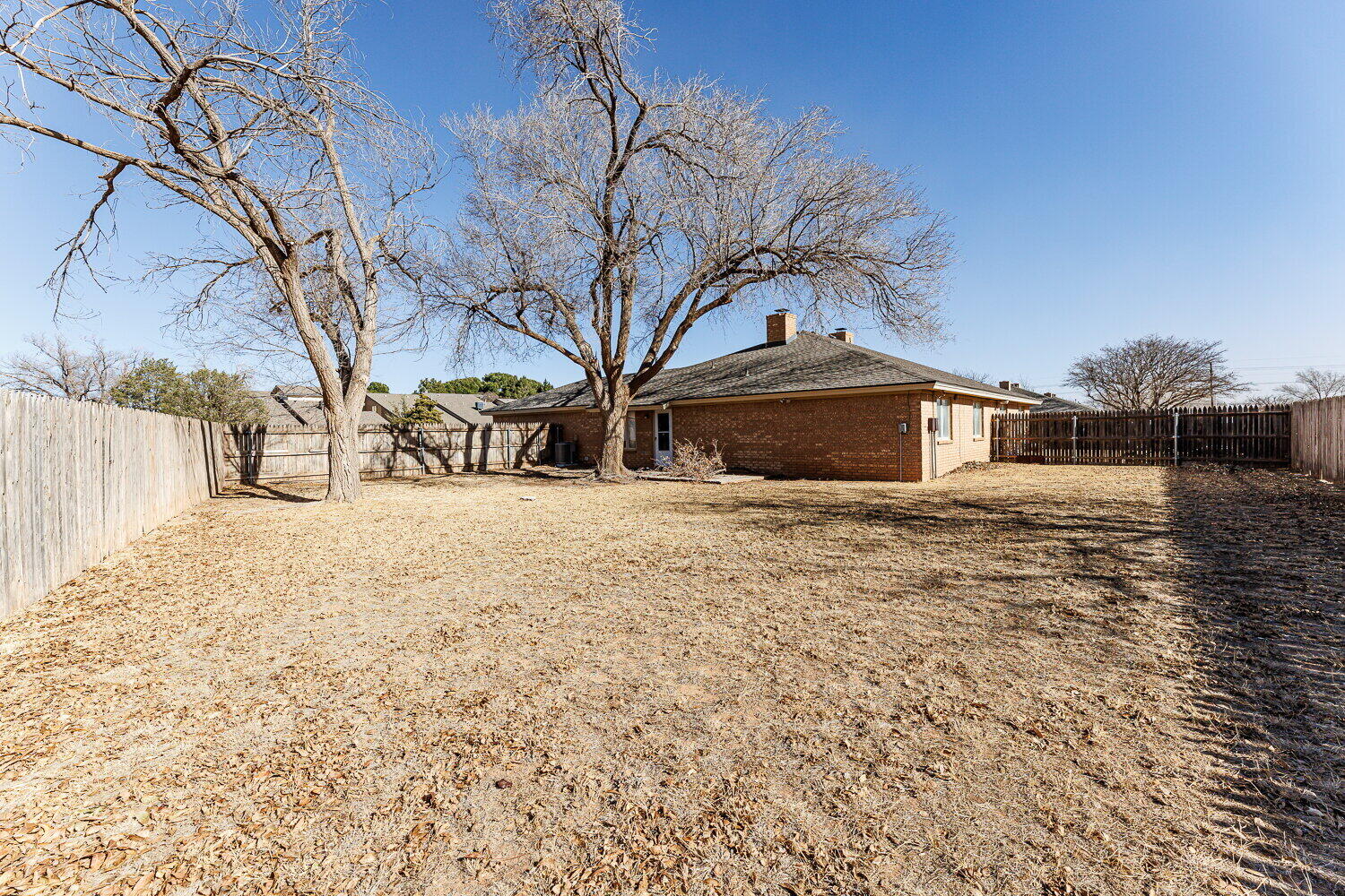 5809 Emory Street Lubbock, TX 79416 - Photo 28 of 30 a house view with snow on the road