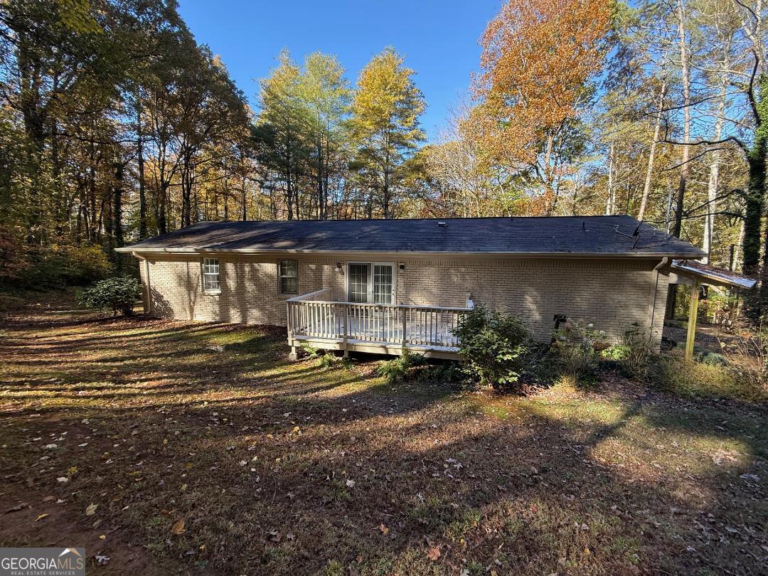 238 Settlers Point Clarkesville, GA 30523 - Photo 23 of 27 a view of a house with backyard and sitting area