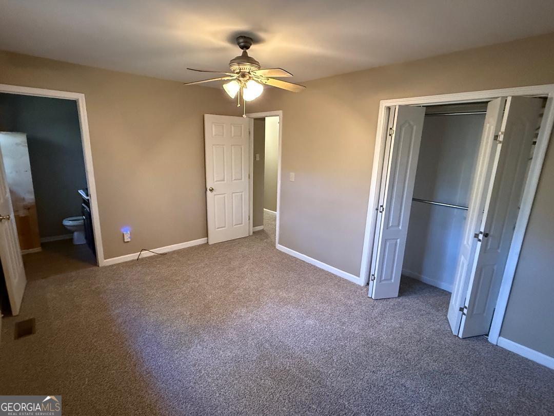 238 Settlers Point Clarkesville, GA 30523 - Photo 7 of 27 a view of an empty room with a mirror