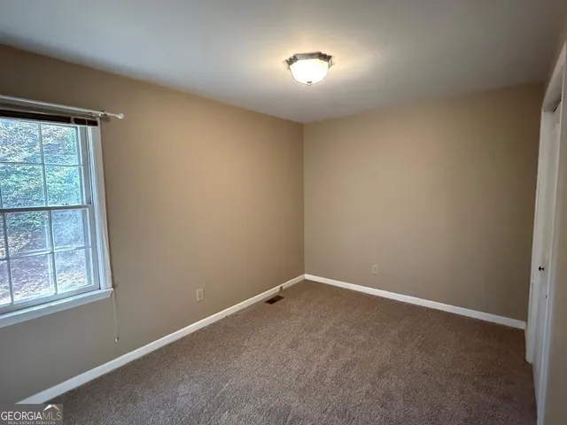 an empty room with a window