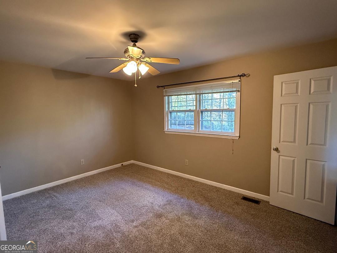 238 Settlers Point Clarkesville, GA 30523 - Photo 10 of 27 a view of an empty room with a window