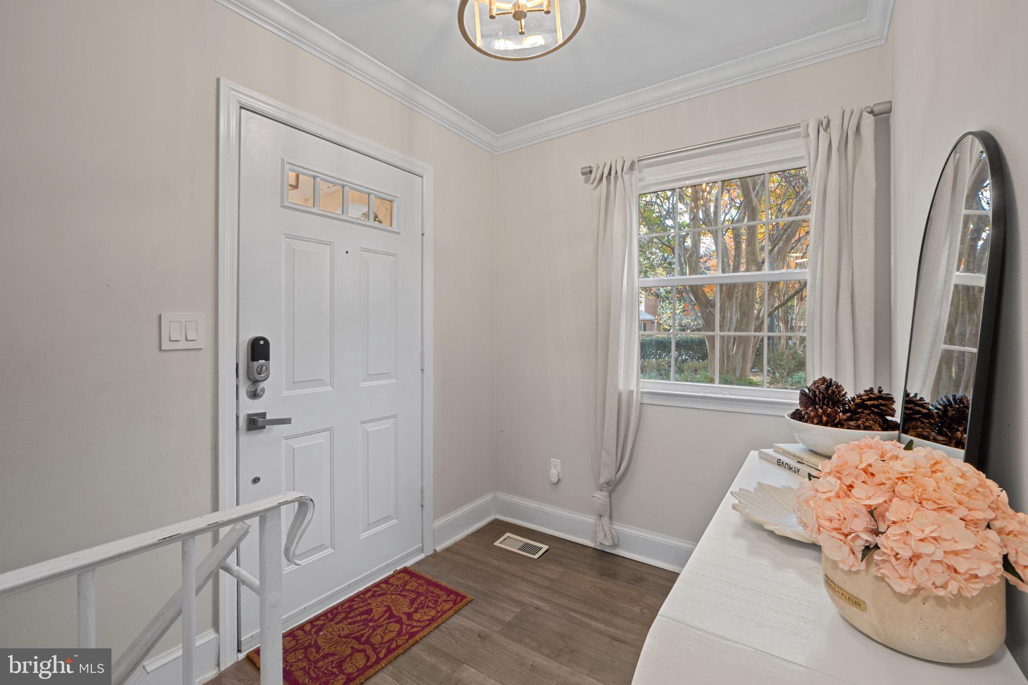 4311 Massachusetts Avenue Northwest Washington, DC 20016 - Photo 19 of 30 Welcoming entryway with natural light.