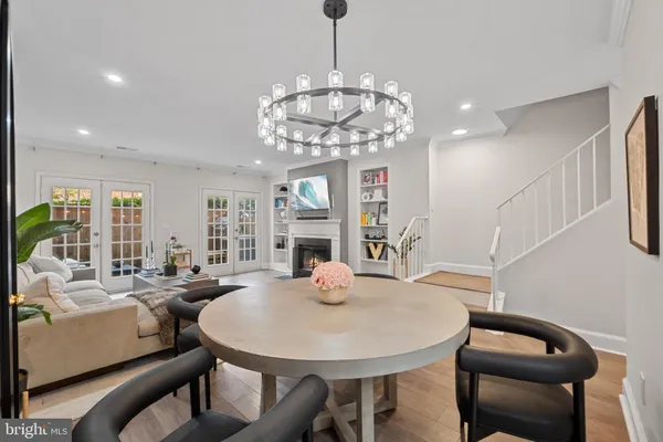 a view of a livingroom with furniture and wooden floor