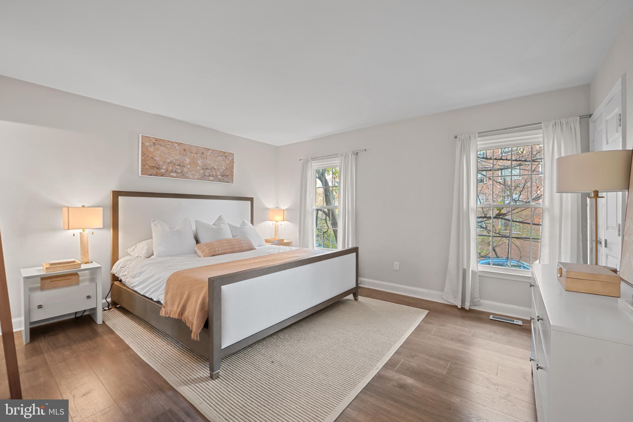 4311 Massachusetts Avenue Northwest Washington, DC 20016 - Photo 6 of 30 Serene bedroom with natural light and style.