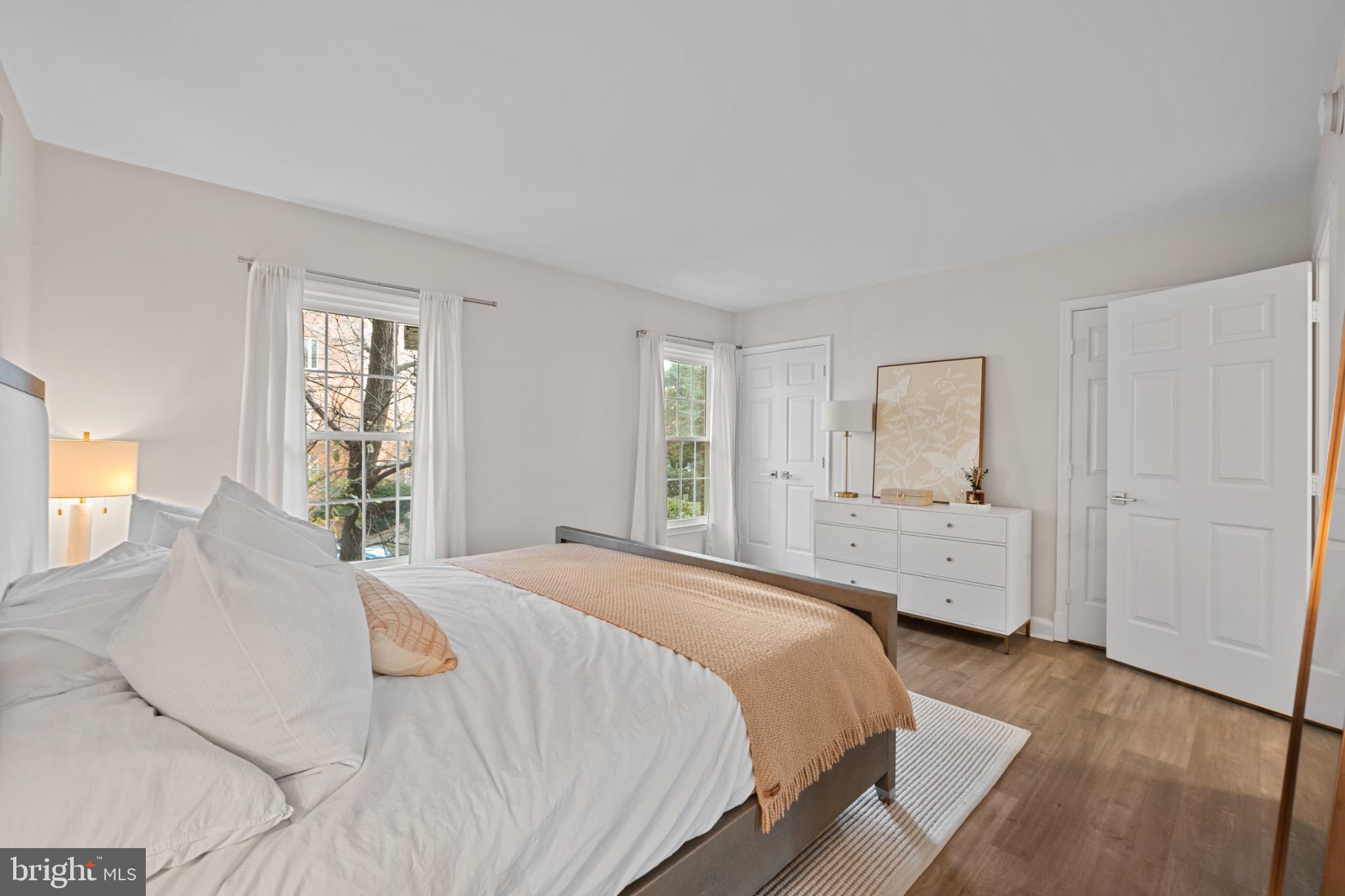 4311 Massachusetts Avenue Northwest Washington, DC 20016 - Photo 9 of 30 Serene bedroom with natural light and views.