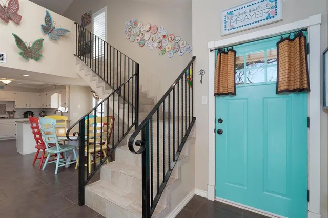 a room with toys and dresser