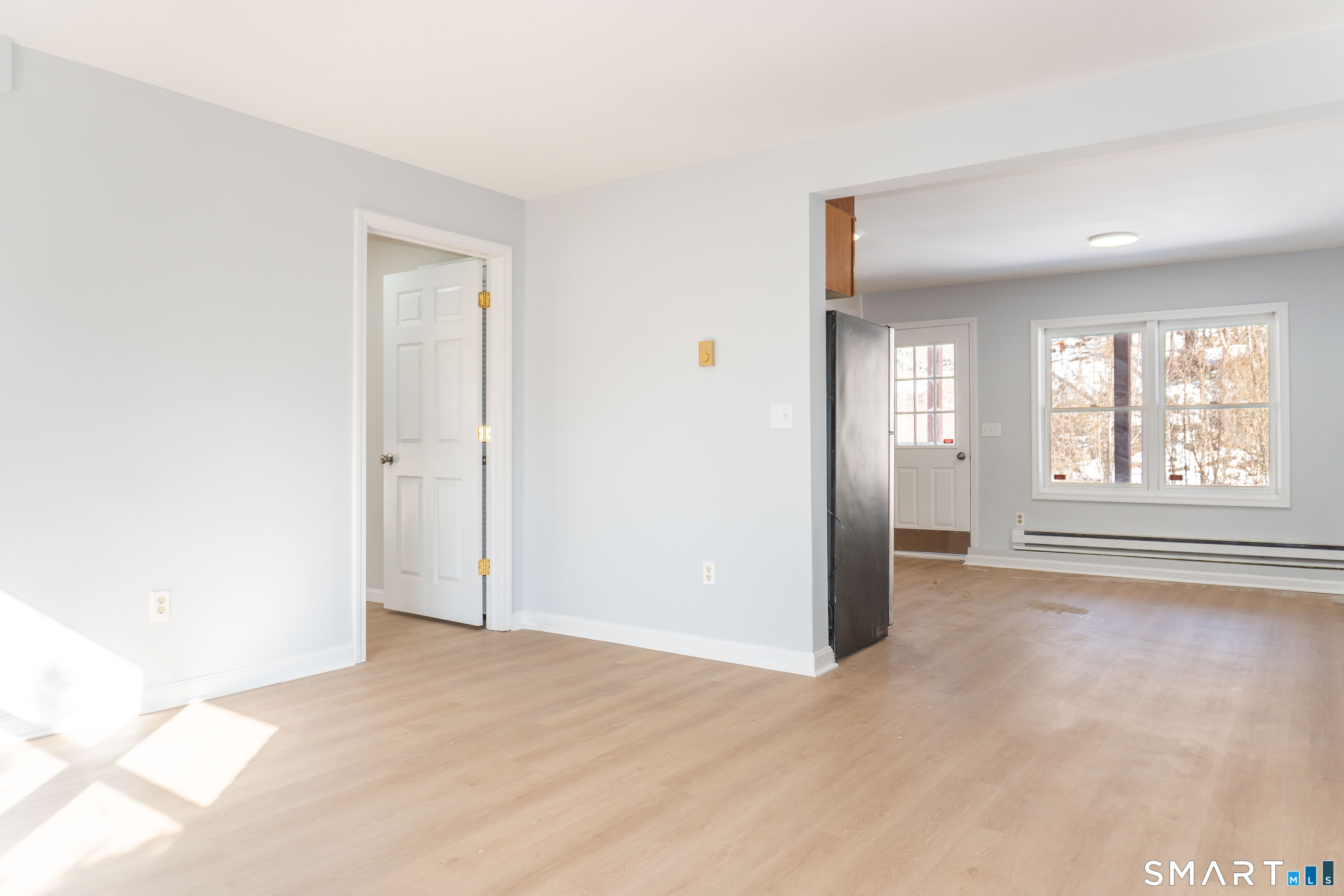 53 High Street Naugatuck, CT 06770 - Photo 12 of 28 an empty room with windows and closet