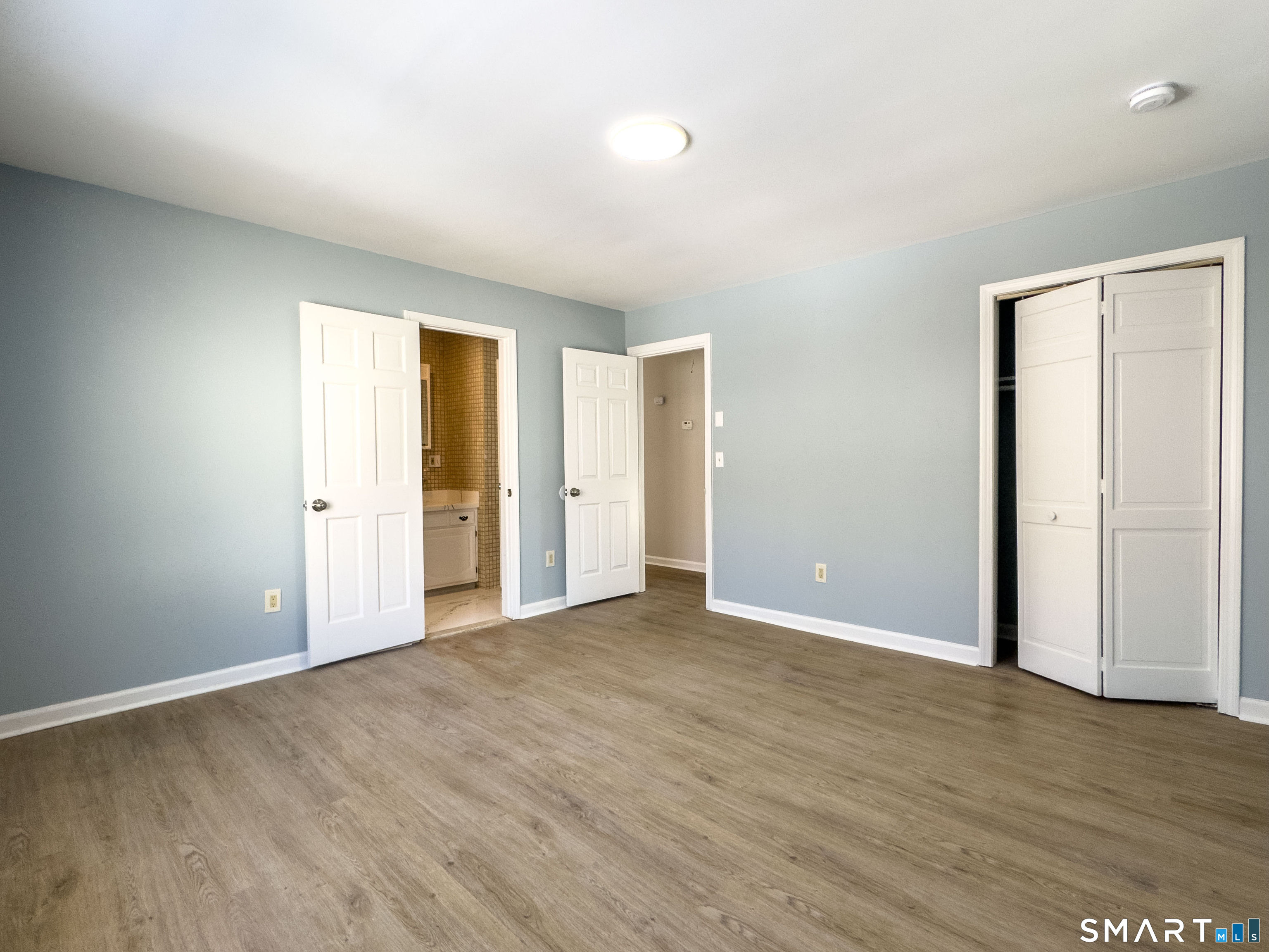 53 High Street Naugatuck, CT 06770 - Photo 15 of 28 a view of an empty room with wooden floor