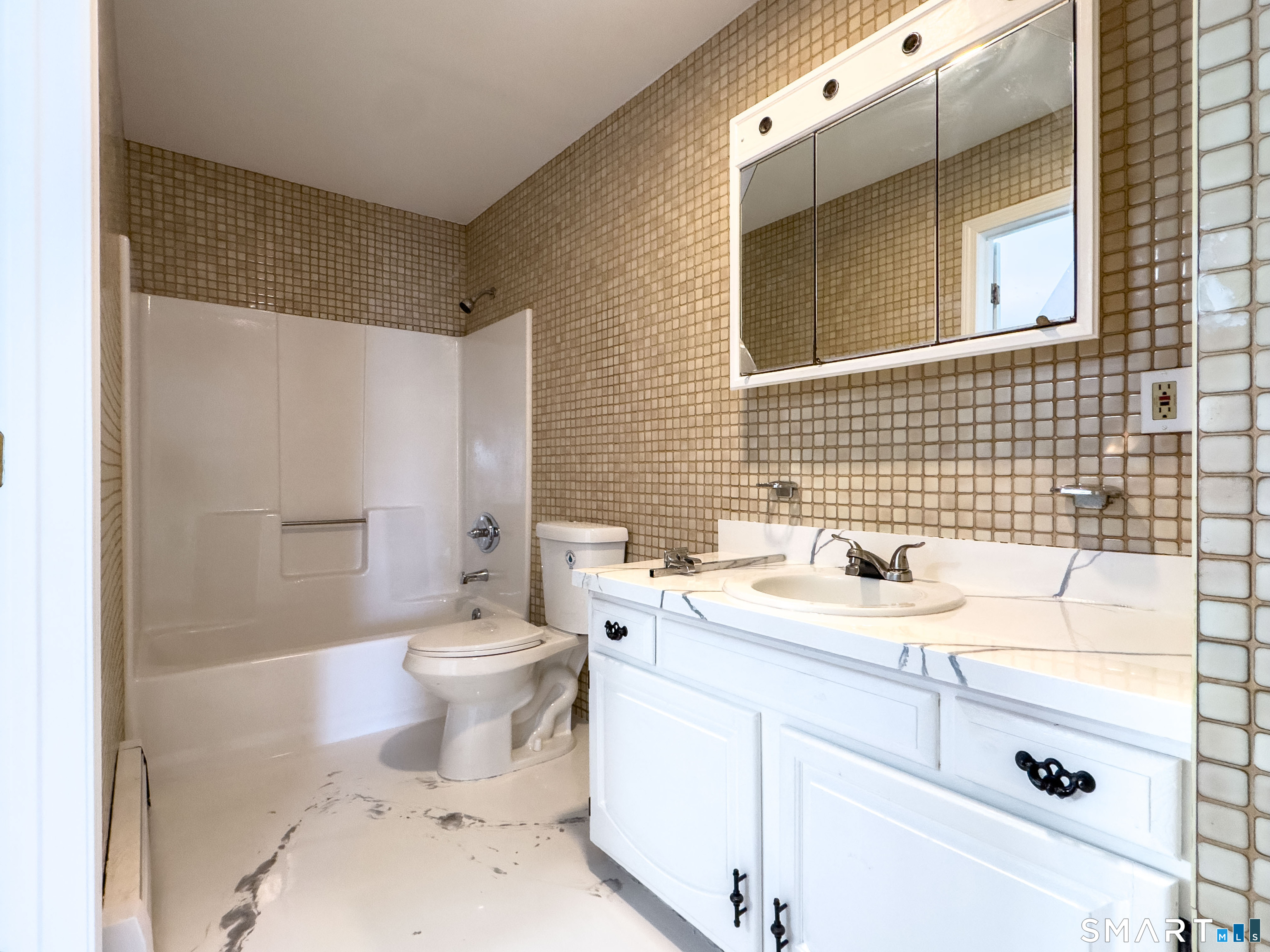 53 High Street Naugatuck, CT 06770 - Photo 20 of 28 a bathroom with a sink a toilet and shower