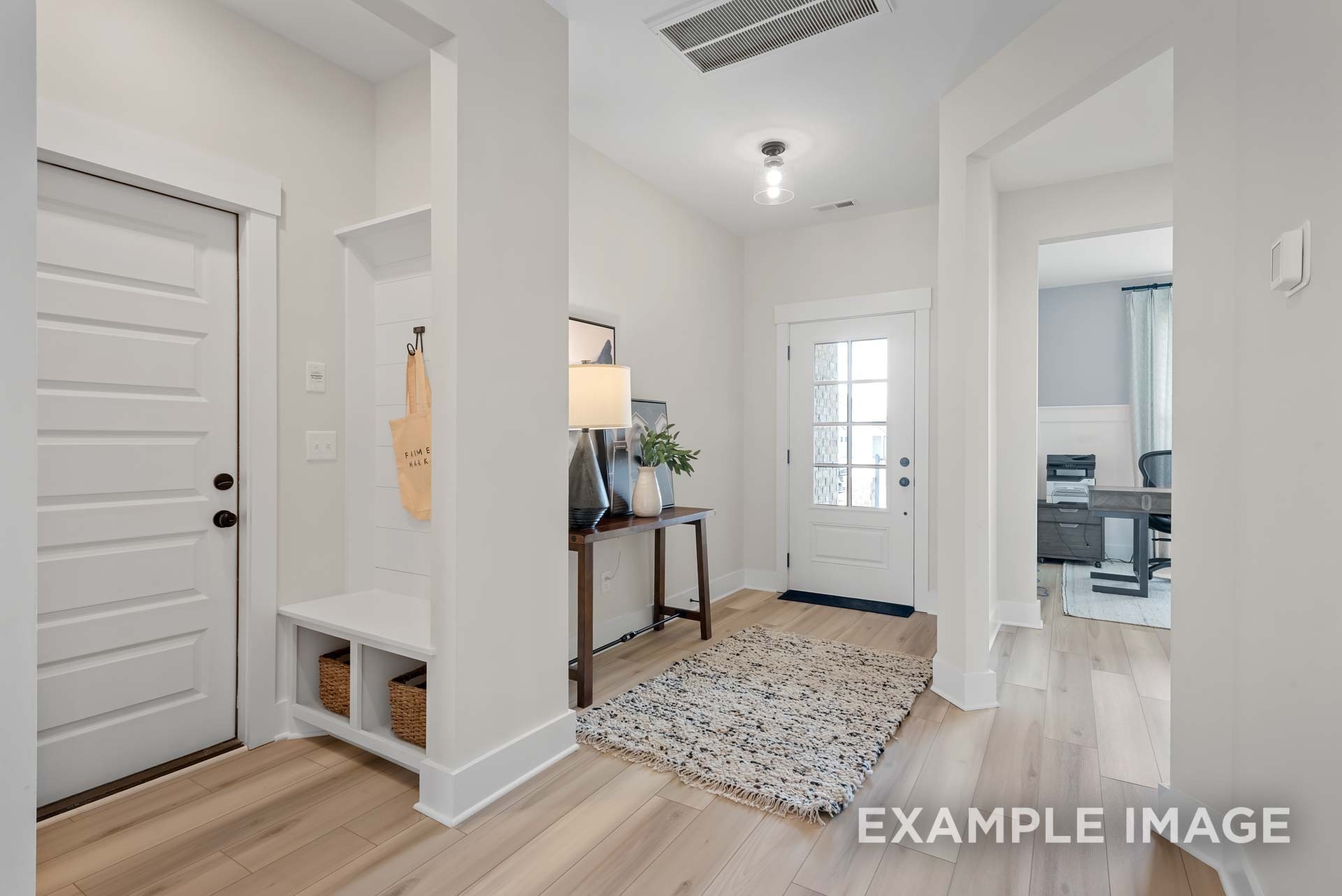 109 Rock Chimney Road Gallatin, TN 37066 - Photo 7 of 92 a view of a hallway with wooden floor and furniture