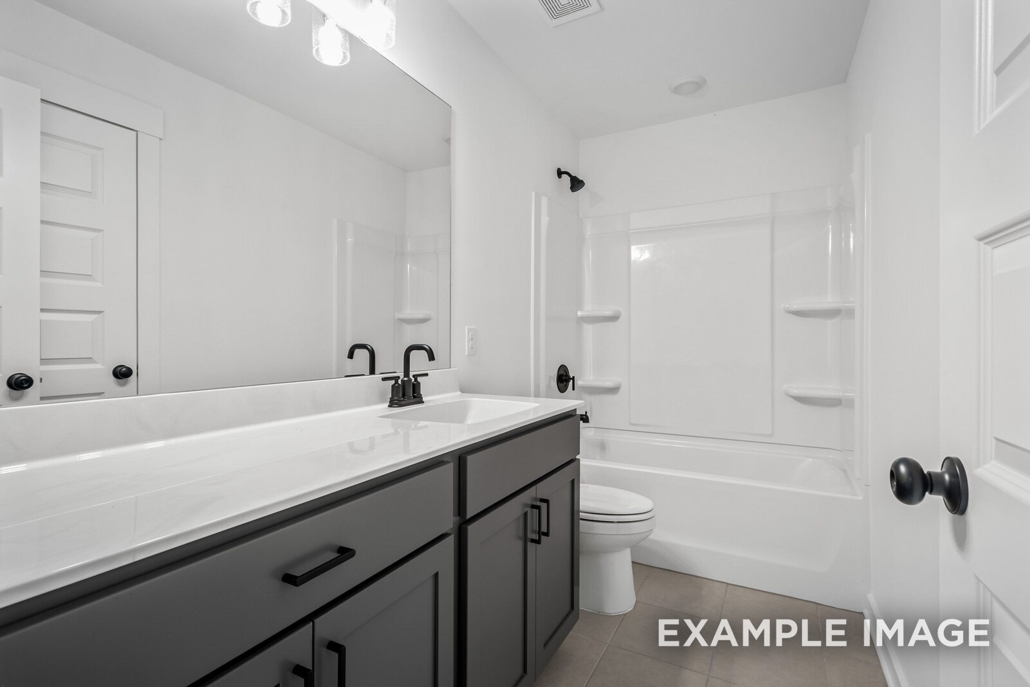 109 Rock Chimney Road Gallatin, TN 37066 - Photo 78 of 92 a bathroom with a sink a toilet and shower