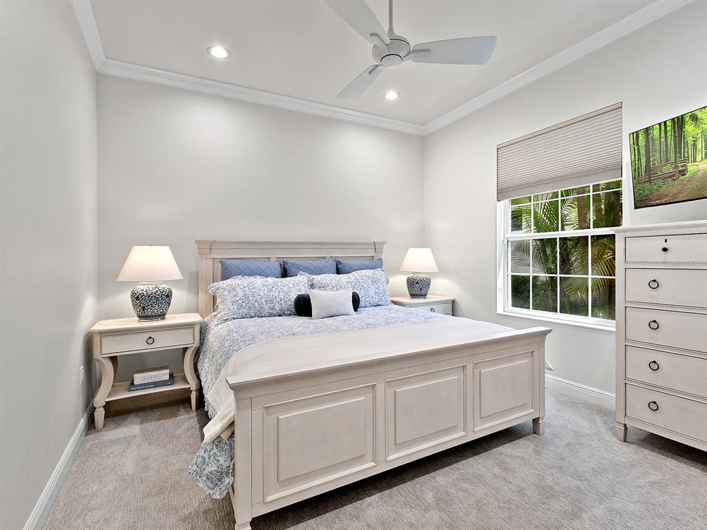 7431 Greystone Street Lakewood Ranch, FL 34202 - Photo 43 of 85 a bedroom with a bed and a window