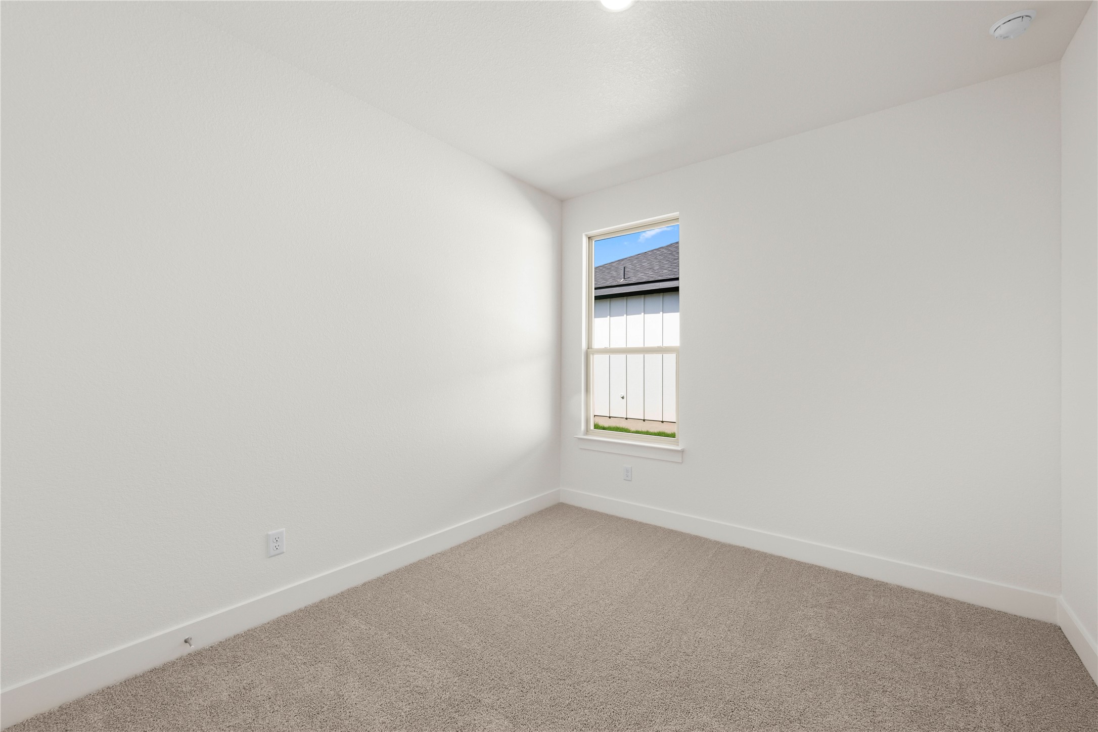 552 Gus Loop Georgetown, TX 78626 - Photo 19 of 23 a view of an empty room with a window