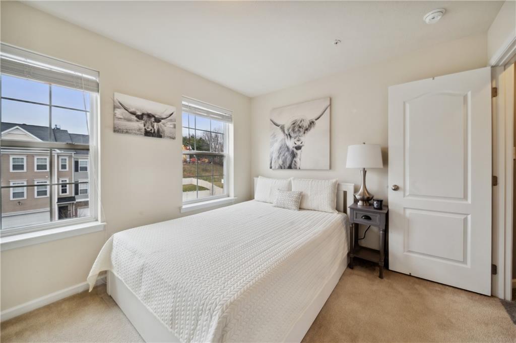 25 Truman Circle McKees Rocks, PA 15136 - Photo 17 of 25 a bedroom with a bed and a window