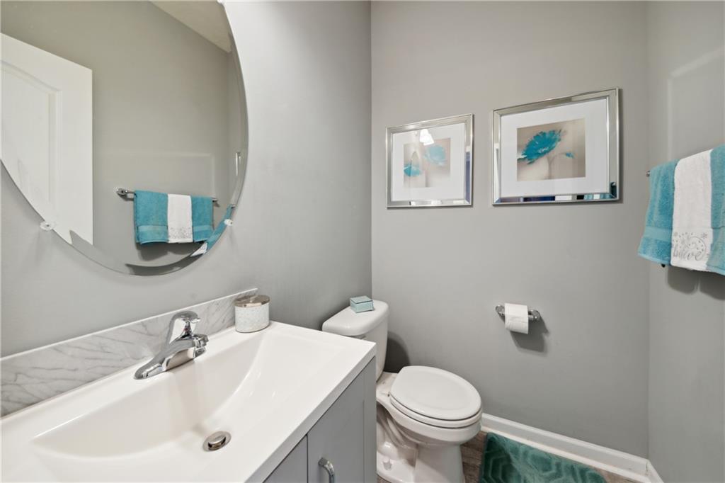 25 Truman Circle McKees Rocks, PA 15136 - Photo 19 of 25 a bathroom with a sink mirror and toilet