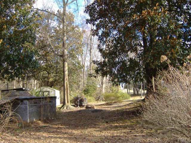 10666 Cleveland Road Garner, NC 27529 - Photo 4 of 10 a view of a yard with large trees