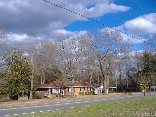 10666 Cleveland Road Garner, NC 27529 - Photo 10 of 10 a view of a big yard with large trees