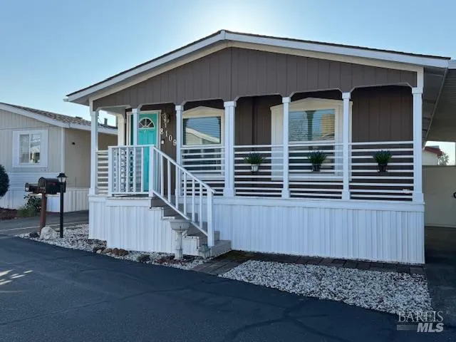 a front view of a house with garage