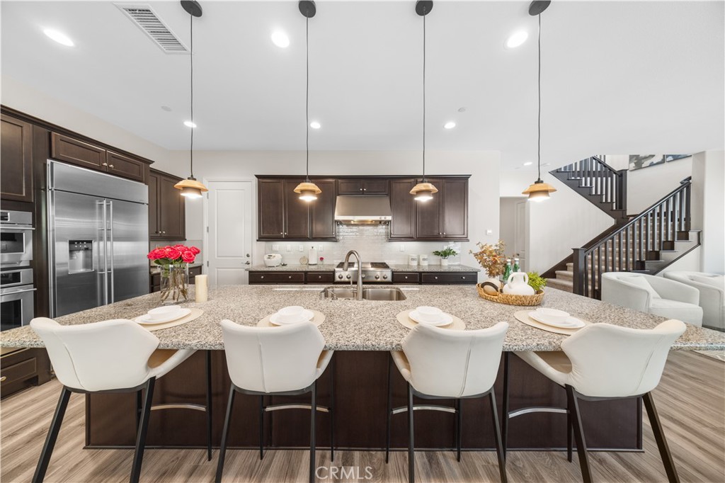 111 Lovelace Irvine, CA 92620 - Photo 15 of 55 a view of a dining room with furniture