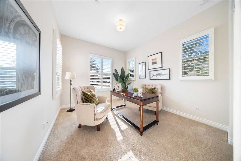 111 Lovelace Irvine, CA 92620 - Photo 20 of 55 a living room with furniture and a large window