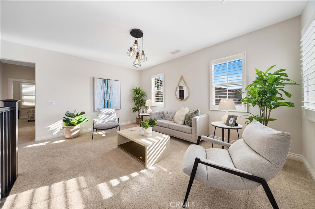 111 Lovelace Irvine, CA 92620 - Photo 22 of 55 a living room with furniture potted plant and a window