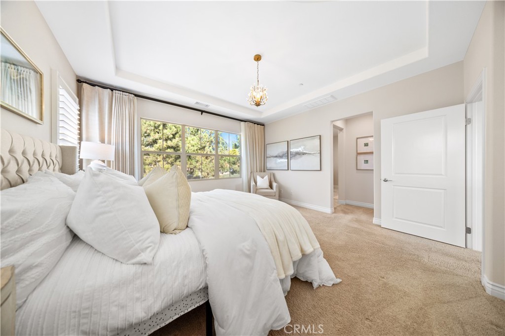 111 Lovelace Irvine, CA 92620 - Photo 27 of 55 a bedroom with a large bed and a window