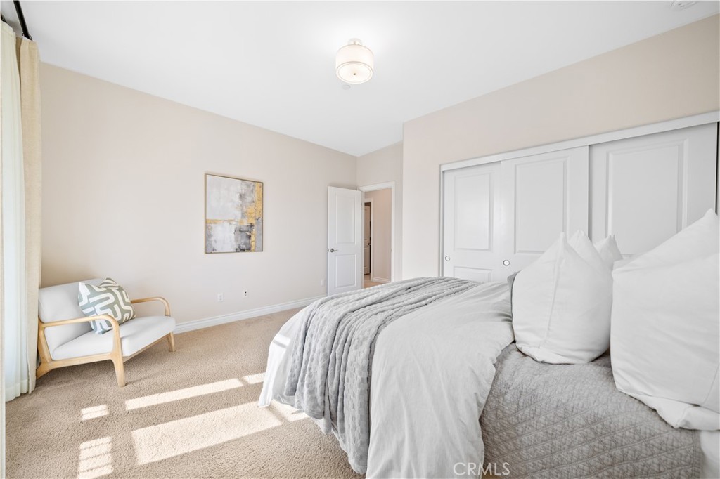 111 Lovelace Irvine, CA 92620 - Photo 28 of 55 a bedroom with a bed and a window