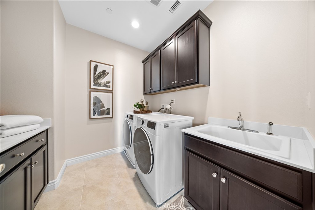 111 Lovelace Irvine, CA 92620 - Photo 39 of 55 a utility room with dryer and washer