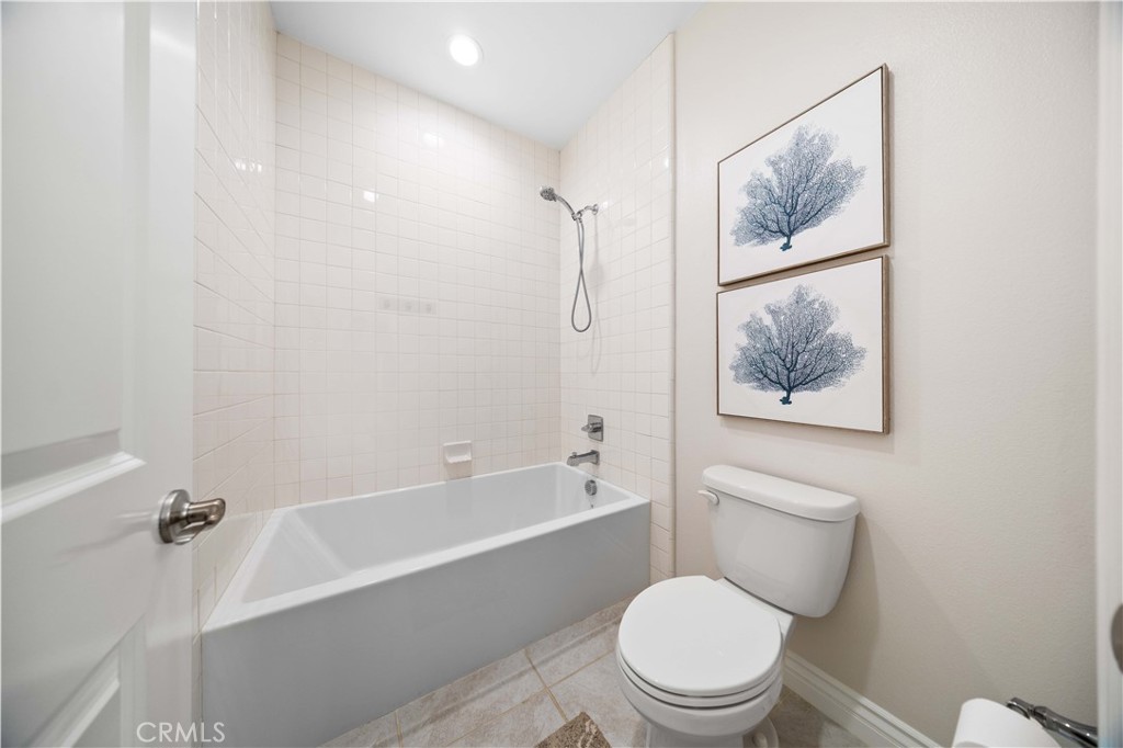 111 Lovelace Irvine, CA 92620 - Photo 41 of 55 a white toilet sitting next to a bath tub
