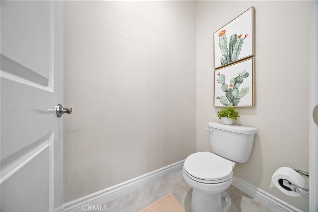 111 Lovelace Irvine, CA 92620 - Photo 42 of 55 a white toilet sitting next to a bathroom sink