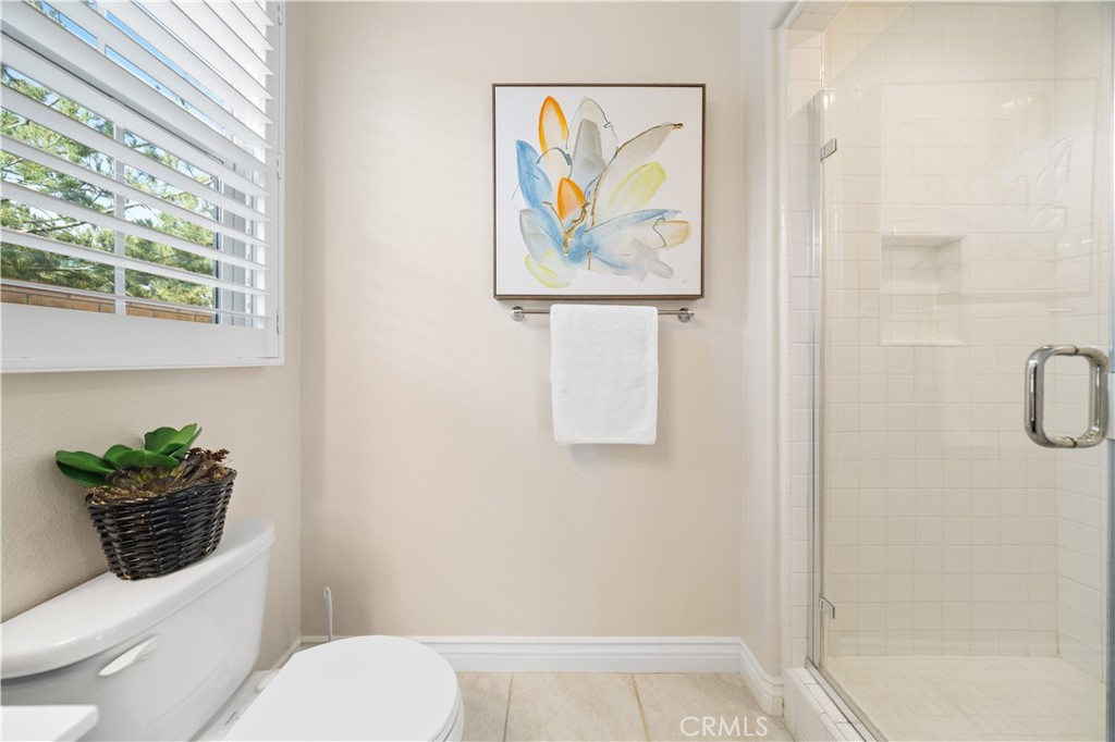111 Lovelace Irvine, CA 92620 - Photo 43 of 55 a bathroom with a toilet a sink and tub