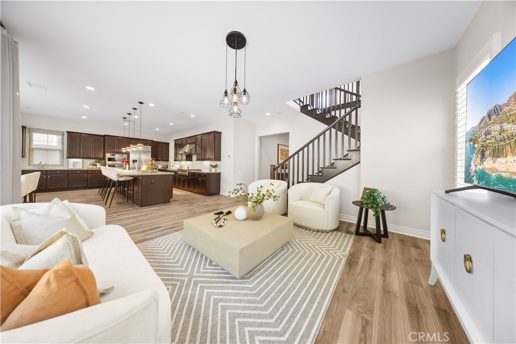 111 Lovelace Irvine, CA 92620 - Photo 7 of 55 a living room with furniture and wooden floor