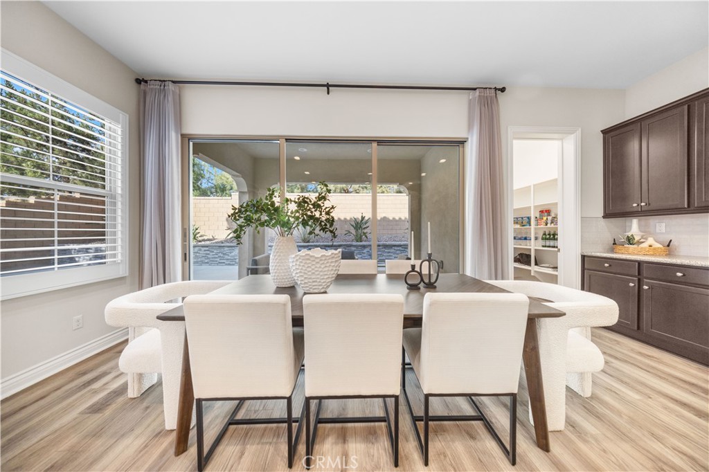 111 Lovelace Irvine, CA 92620 - Photo 10 of 55 a dining room with furniture and window