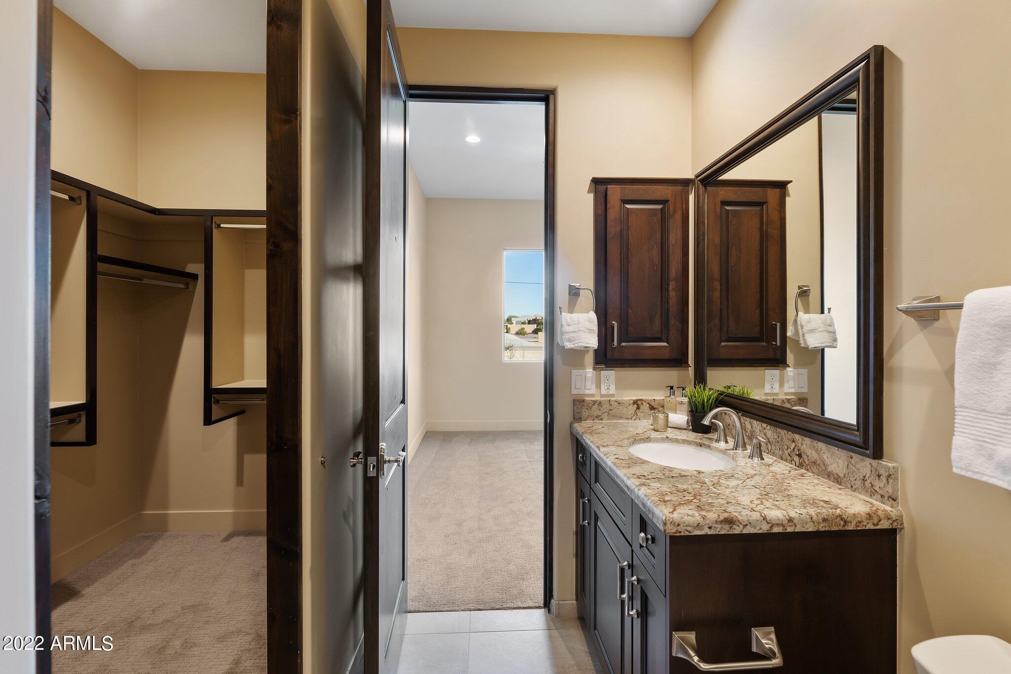1315 West Irvine Road Phoenix, AZ 85086 - Photo 23 of 34 Guest Bath 1 & Walk-In Closet